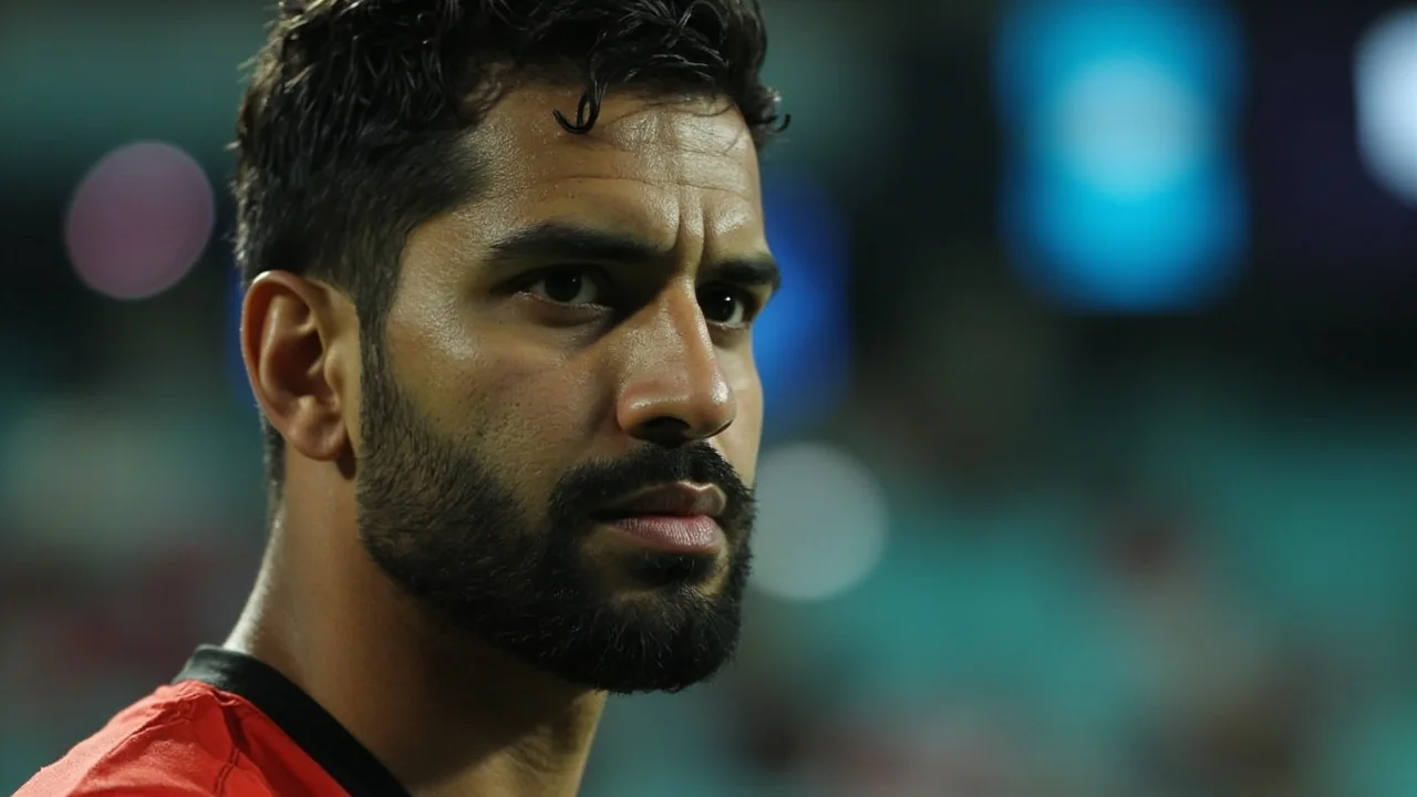 A close editorial frame of a coach in the dugout with a tablet, the kind of match-day posture that a new IPL head coach steps into during a first season in charge.